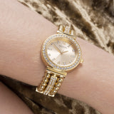 Worn on the wrist, the Guess Gala sits comfortably thanks to its petite 30mm case size. The champagne dial and crystal bracelet add refined sparkle to any formal or everyday outfit.