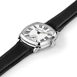Hamilton American Classic Cushion Mechanical Women’s 30mm Watch H36109710 is captured at a 3/4 angle, showing the white dial, steel case and black leather strap together. The angle highlights the soft cushion shape of the case.