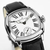 Hamilton American Classic Cushion Mechanical Women’s 30mm Watch H36109710 is shown in close up, revealing the black Roman numerals, railway minute track and small seconds sub-dial. The slim hands stand out against the white dial.