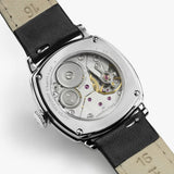 Hamilton American Classic Cushion Mechanical Women’s 30mm Watch H36109710 features an exhibition case back that reveals the H-42 hand-wound movement. The see-through back shows the mechanical detail behind the 57-hour power reserve.