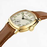 Hamilton American Classic Cushion Mechanical Women’s 30mm Watch H36119520 is shown from the side, displaying the slim yellow gold PVD case and crown. The brown leather strap extends from the lugs beneath the sapphire crystal.