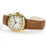 Hamilton American Classic Cushion Mechanical Women’s 30mm Watch H36119520 is shown from the side, displaying the slim yellow gold PVD case and crown. The brown leather strap extends from the lugs beneath the sapphire crystal.