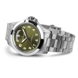 Side profile of Hamilton Khaki Field King H64475160 showing crown protectors, anti-reflective sapphire crystal, and brushed stainless steel case