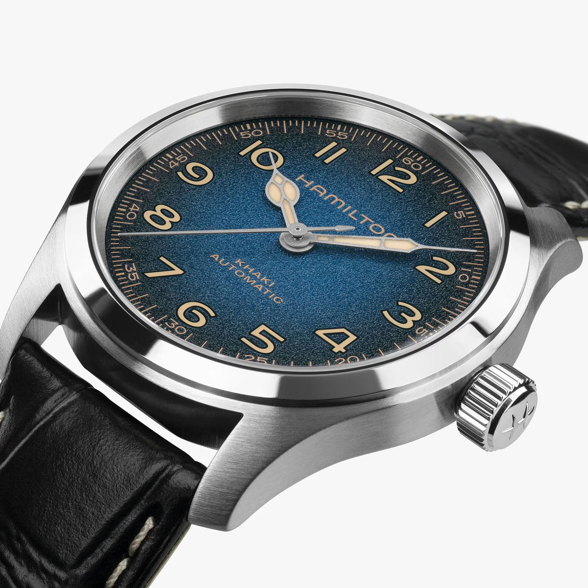 Hamilton Khaki Field Murph Automatic 38mm Watch H70405740 is photographed from the side, revealing the 11.1mm case profile and push-pull crown. The sapphire crystal with anti-reflective coating sits above the gradient dial, protecting it from daily wear and surface scratches.