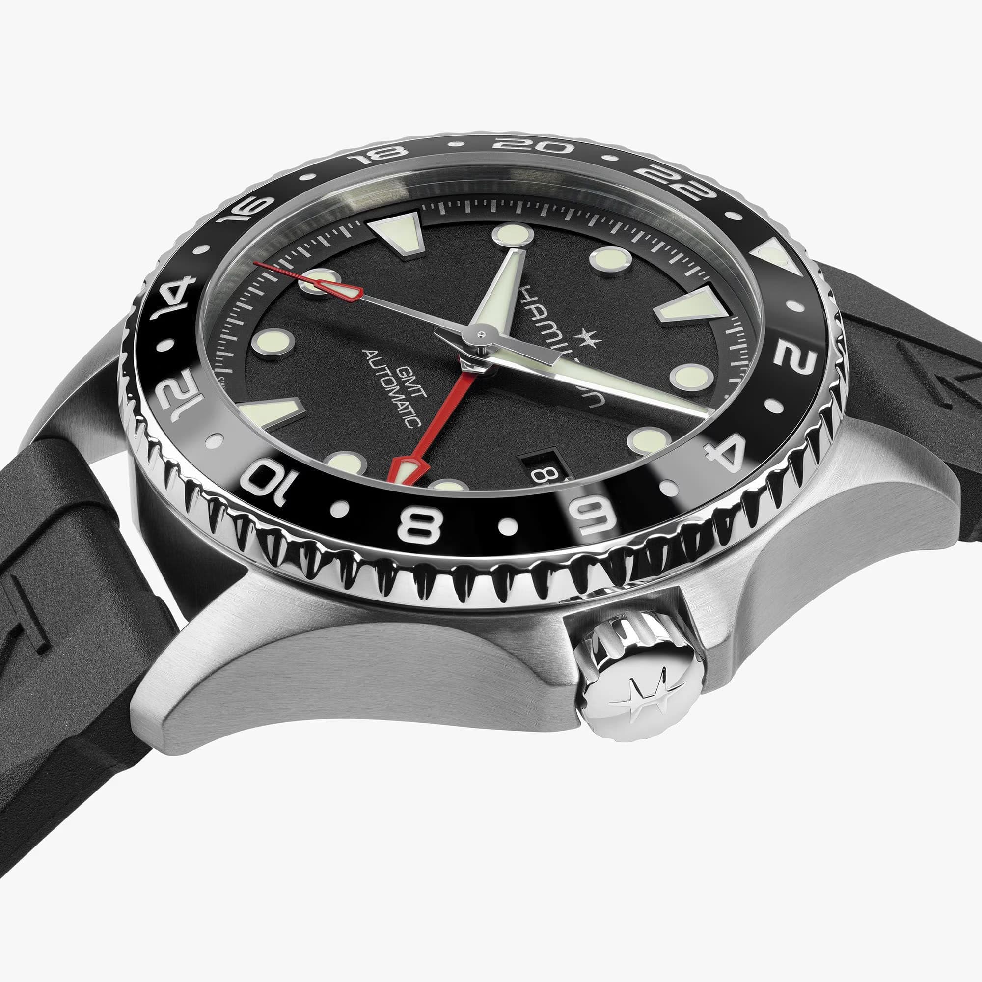 Hamilton Khaki Navy Scuba Auto GMT 43mm Watch H82555330 shows a 13.9mm case thickness with a screw-down crown reinforcing its 300m water resistance. The stainless steel case is brushed for a rugged, dive-inspired finish.