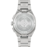 The titanium bracelet connects to the case via Seiko's quick-change system, allowing tool-free swaps with the included blue-and-white silicone strap. The case back is a screwed titanium construction for secure water resistance.