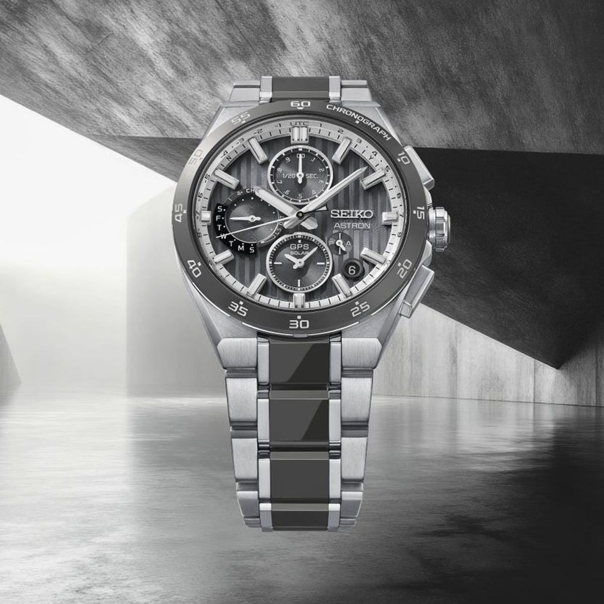 The Seiko Astron GPS Solar 43.20mm Men's Watch HAB007J reveals the dial's fine striped texture and grey ceramic bezel detailing in close detail.