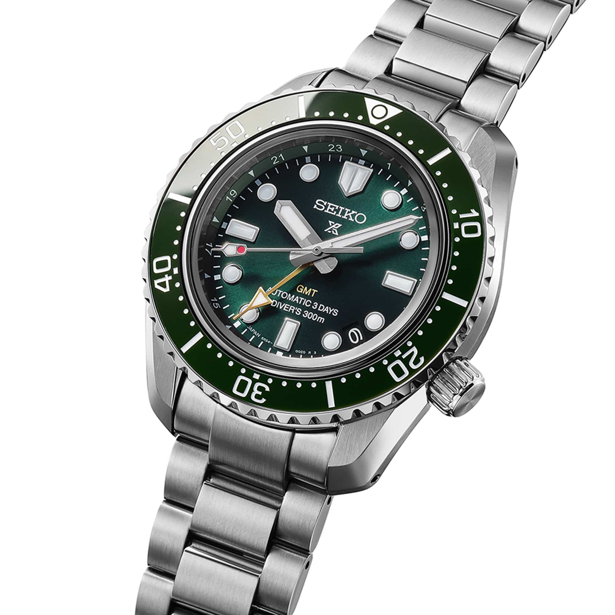 The Seiko Prospex HBC001J features a dark green textured dial with oversized LumiBrite-coated markers, a gold-tone GMT hand and a date window. The 42mm stainless steel case is fitted with a green ceramic unidirectional bezel.