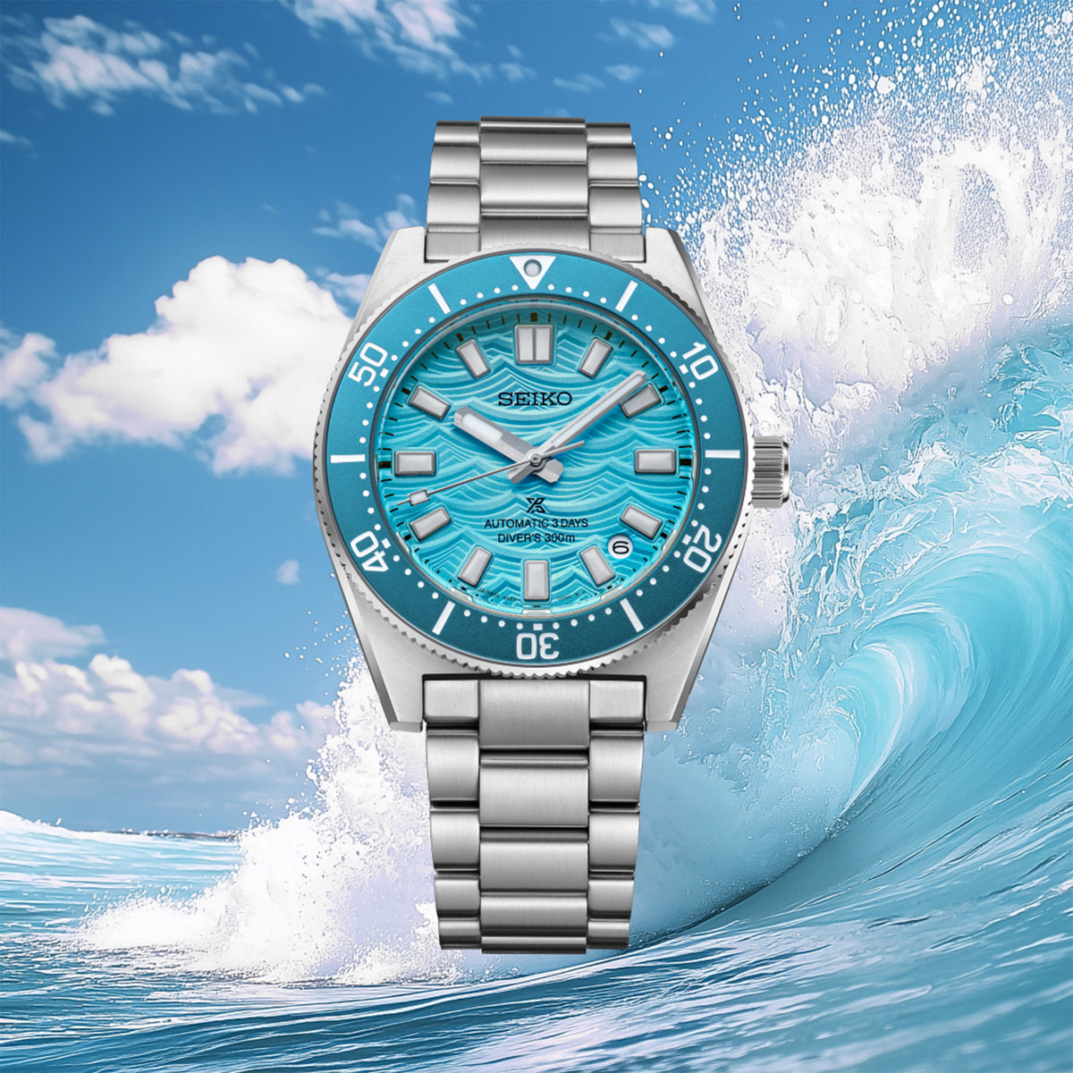 From this angle, the Seiko Prospex Automatic Men’s 40mm Watch HBC011J shows the textured blue wave dial and matching blue bezel together. The stainless steel case and bracelet frame the colour.