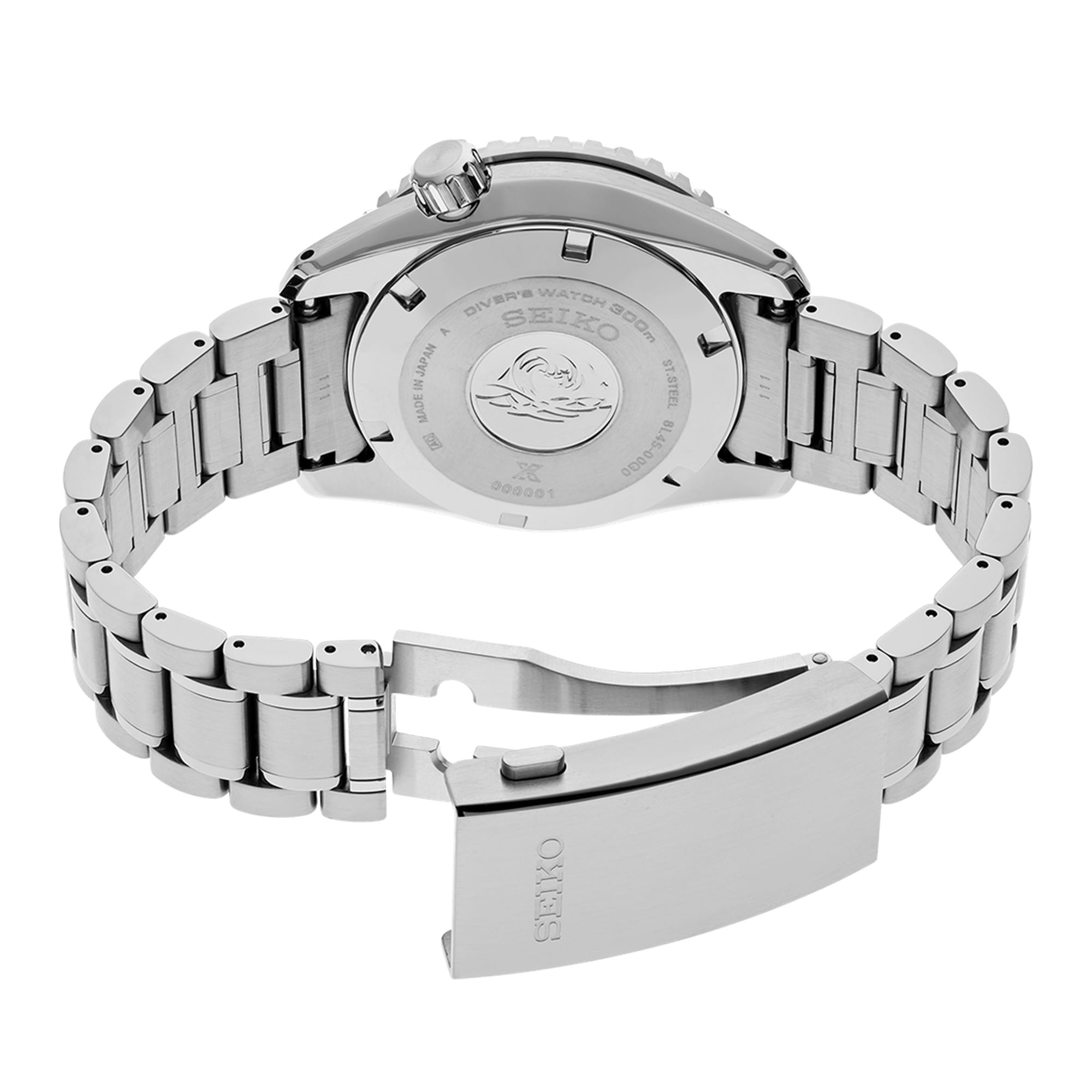 The stainless steel bracelet connects to the case, secured by a three-fold clasp with push-button release and slide adjuster. The screw-down case back contributes to the watch's 300m water resistance rating.