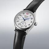 From this angle, the Seiko Presage Automatic 39.60mm Watch HCC005J shows the white enamel dial's depth and the red "12" marker together with the leather strap and stainless steel case.