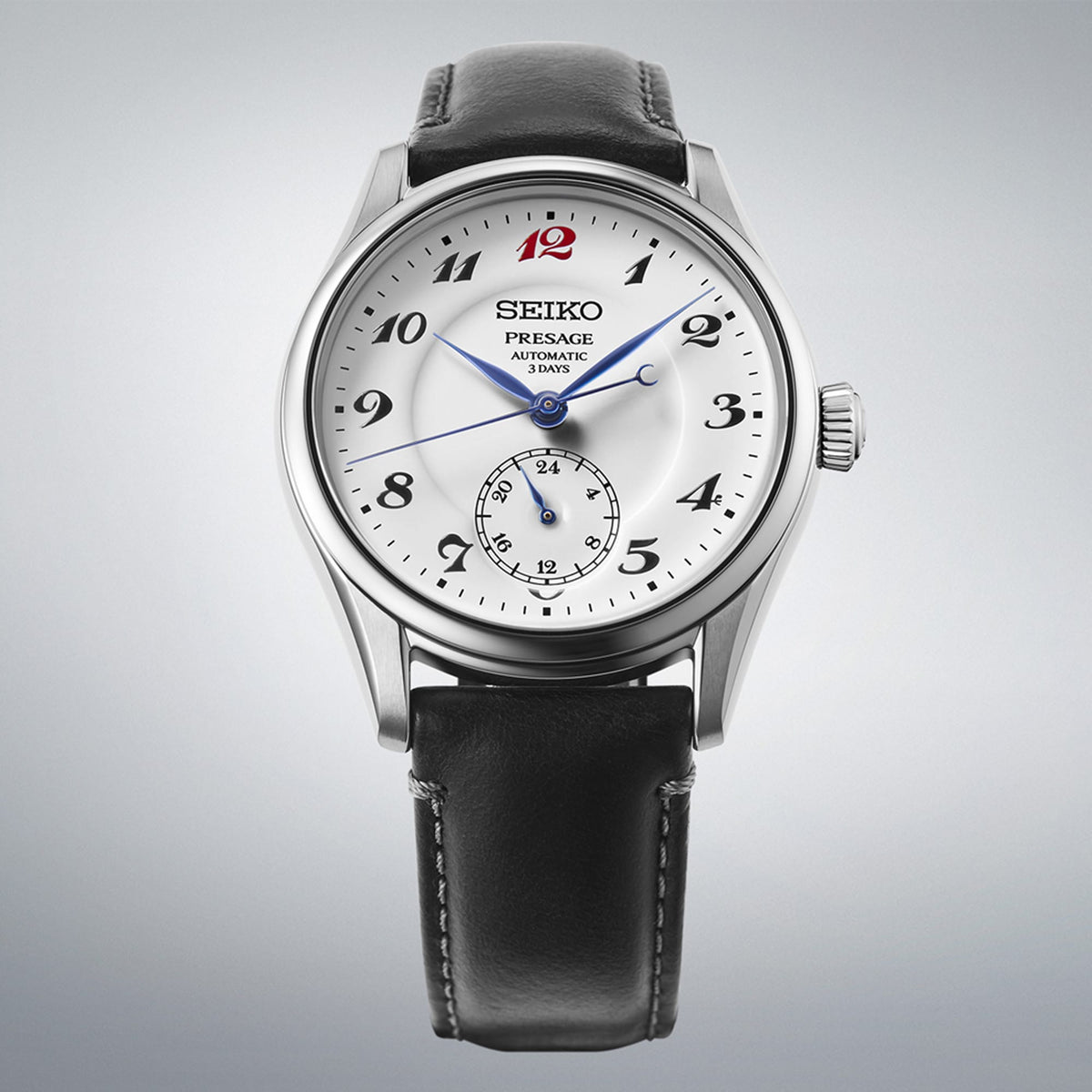 The Seiko Presage Automatic 39.60mm Watch HCC005J reveals the enamel dial's fine craftsmanship, stylised numerals and red marker in close detail.