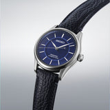 From this angle, the Seiko Presage 145th Anniversary Automatic 39.60mm Men's Watch HCC007J shows the cobalt blue porcelain dial's tonal depth and radiating pattern together with the leather strap and stainless steel case.