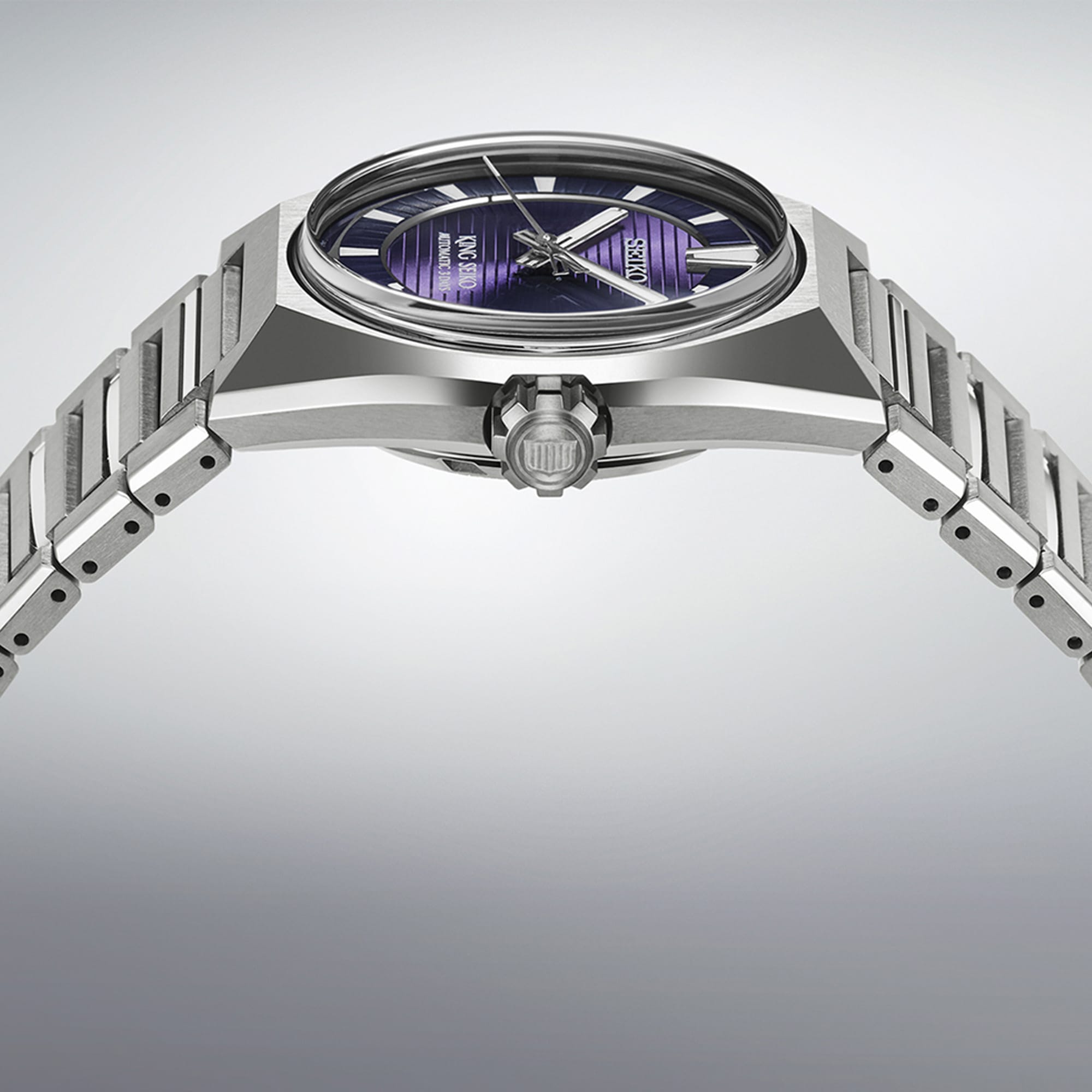The King Seiko VANAC Automatic 41mm Men's Watch HKF001J shows its angular titanium case profile, alternating brushed and polished facets, with a screw-down crown positioned on the case side.