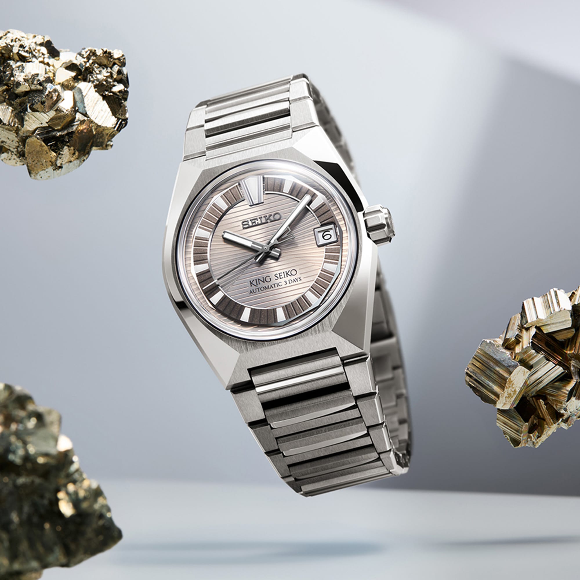 The King Seiko VANAC Automatic 41mm Men's Watch HKF002J shows its angular titanium case profile, alternating brushed and polished facets, with a screw-down crown positioned on the case side.