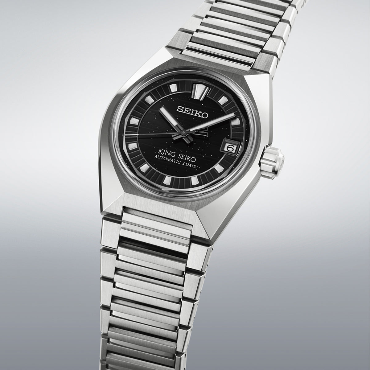 From this angle, the King Seiko VANAC Automatic Men’s 41mm Watch HKF005J shows the black speckled dial and faceted case surfaces together with the integrated steel bracelet.