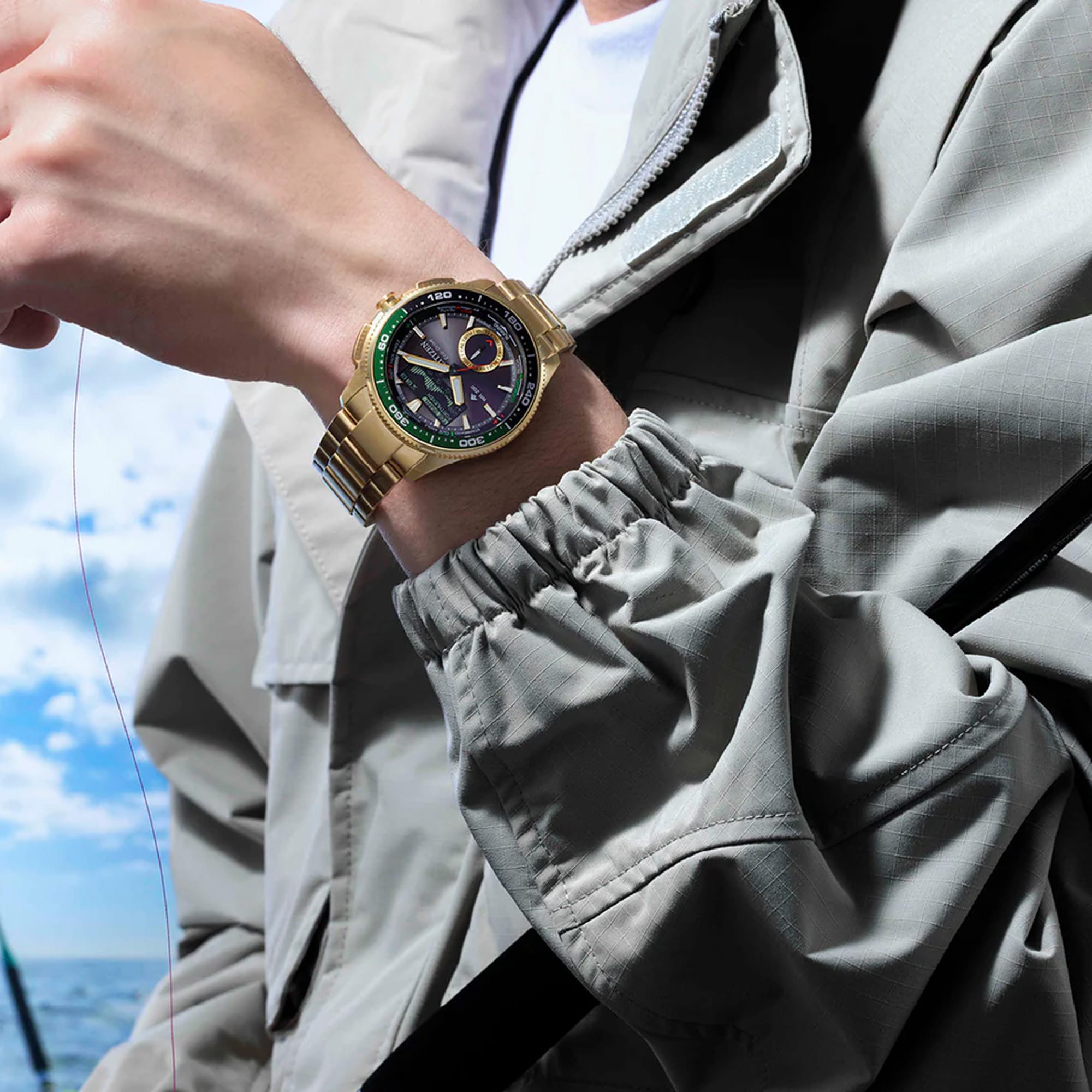 Citizen Promaster Analogue Digital 42mm Men's Watch JV3002-51E - Worn on the wrist, the 42.4mm gold-tone stainless steel case and matching bracelet sit securely for all-day wear. The case size gives it a bold, technical presence.