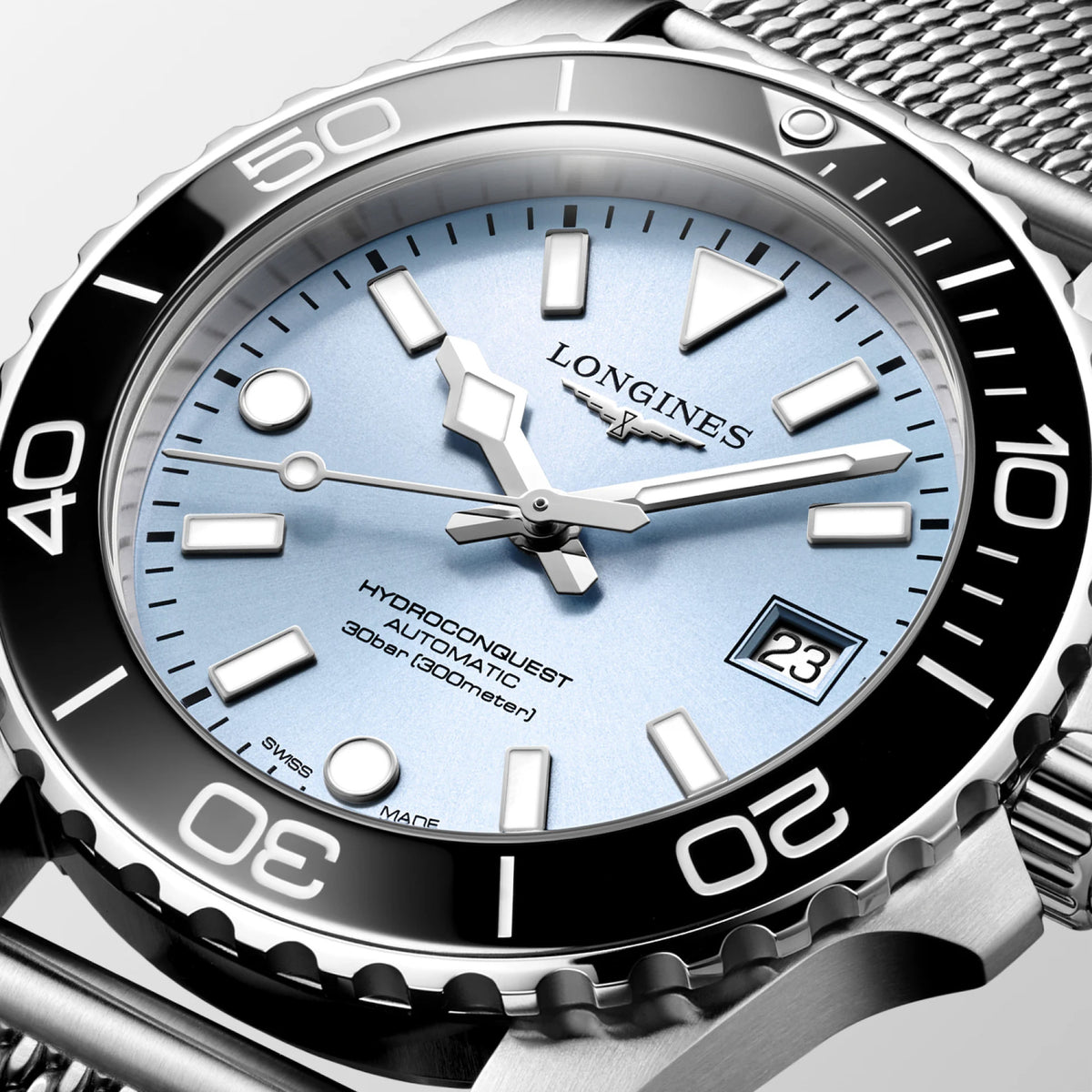 Close-up of the Longines HydroConquest L3.779.4.99.6 dial, showing the frosted blue sunray finish with applied hour markers and Super-LumiNova hands. The double-sided anti-reflective sapphire crystal ensures exceptional clarity and legibility in any lighting condition.