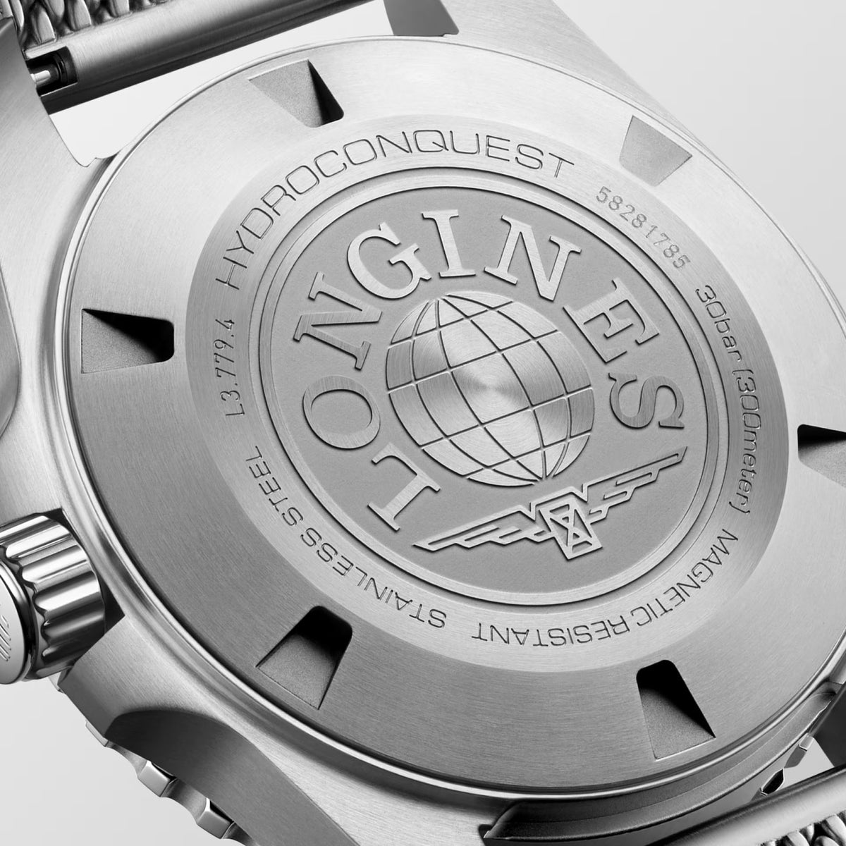 Screw-down caseback of the Longines HydroConquest L3.779.4.99.6, a key feature of its 300-metre water resistance rating. The stainless steel back is engraved with the Longines name, model reference and water resistance specification, reflecting the watch's professional dive credentials.
