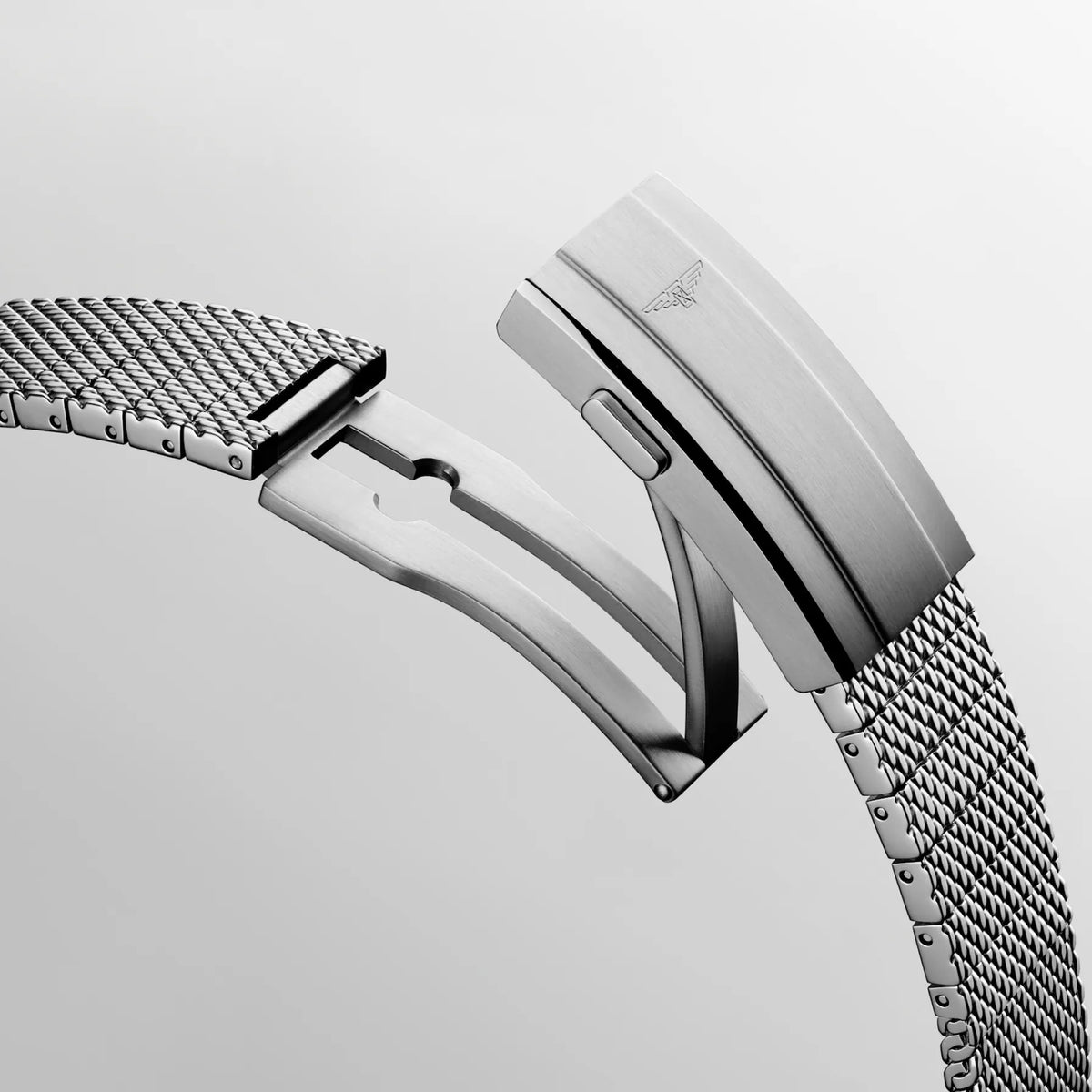 Close-up of the Longines HydroConquest double security folding clasp with micro-adjustment system on the mesh bracelet. The micro-adjustment feature allows precise sizing for comfort over a wetsuit or bare skin, making this an ideal companion for both water sports and daily wear.