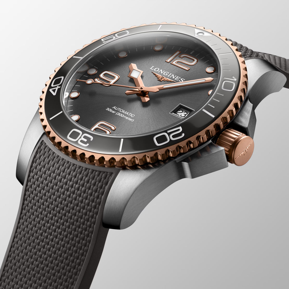 From this angle, the Longines Hydro Conquest Automatic Men’s 41mm Watch L3.781.3.78.9 shows the grey ceramic bezel, sunray dial and rose gold-tone accents together.