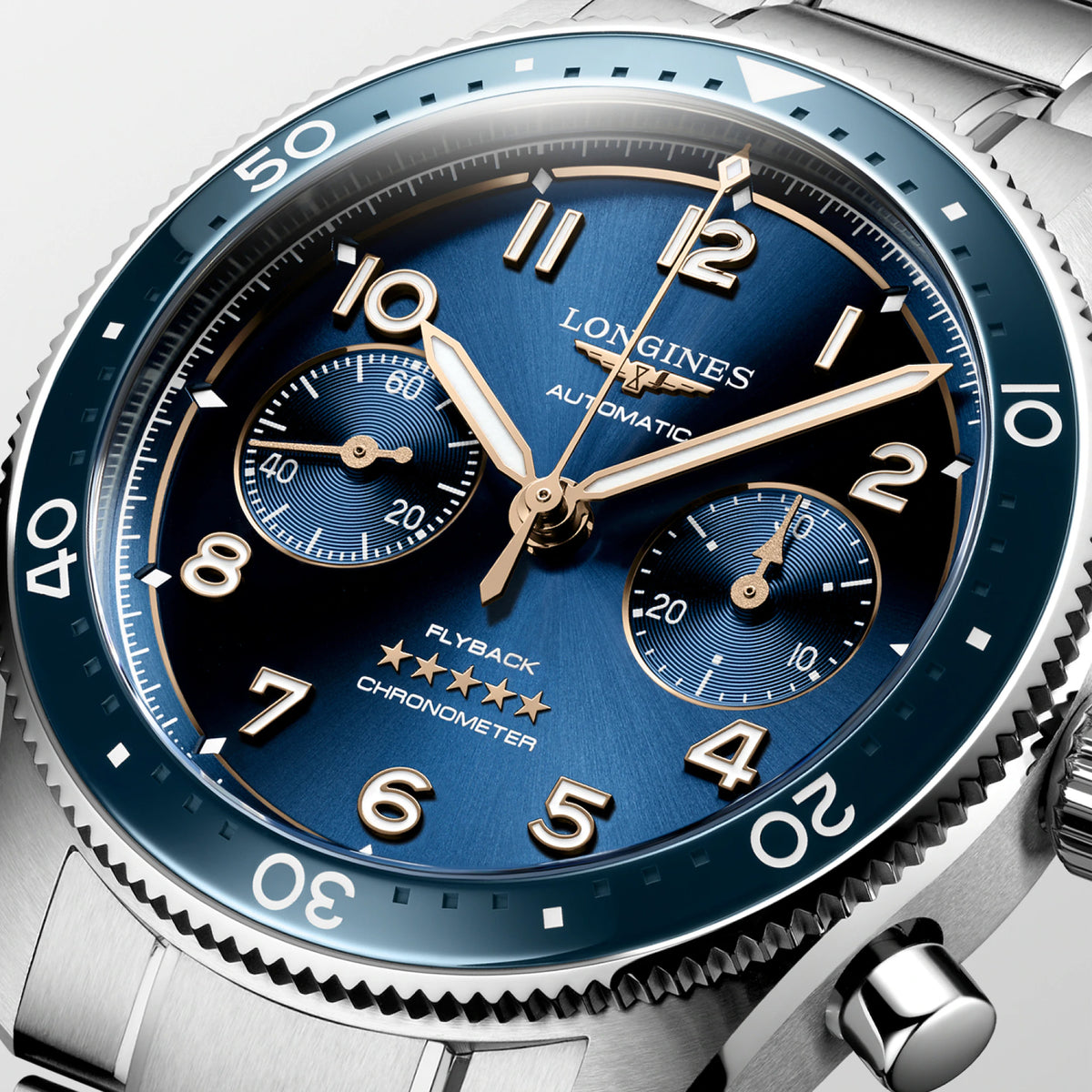 Close-up of the blue sunray dial on the Longines Spirit Flyback Automatic Chronograph Men's 42mm Watch L3.821.4.93.6. The detail shows the small seconds sub-dial at 9 o'clock, the 30-minute counter at 3 o'clock and the central chronograph seconds hand beneath sapphire crystal.