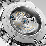 Back view of the Longines Spirit Flyback Automatic Chronograph Men's 42mm Watch L3.821.4.93.6, showing its sapphire crystal case back secured with six screws. The case back shows the exclusive L791 automatic flyback chronograph movement, which is COSC-certified as a chronometer.