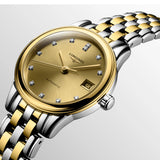 Three-quarter angle view of the Longines Flagship Classic Automatic Women’s 26mm Watch L4.274.3.37.7, showing the case profile, crown and gently curved lugs. The angle highlights the two-tone finish of the stainless steel and yellow PVD case.