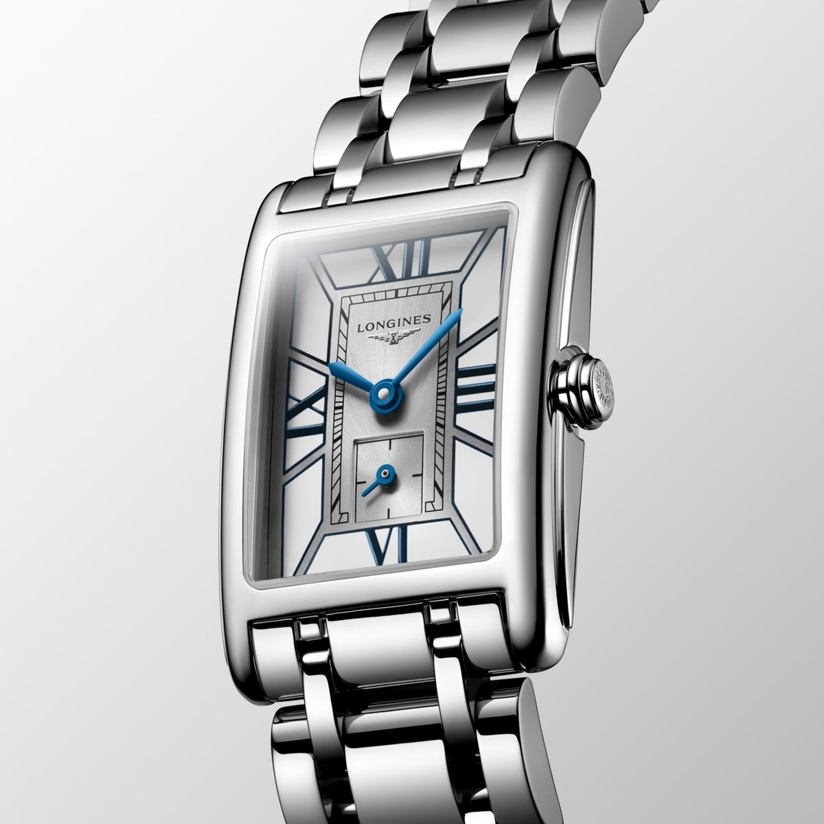 three-quarter angle view of the Longines DolceVita Quartz Women’s 20.8 x 32mm Watch L5.255.4.75.6, showing the slim case profile and crown. The angle highlights the curved rectangular stainless steel case and its classic tank-style design.