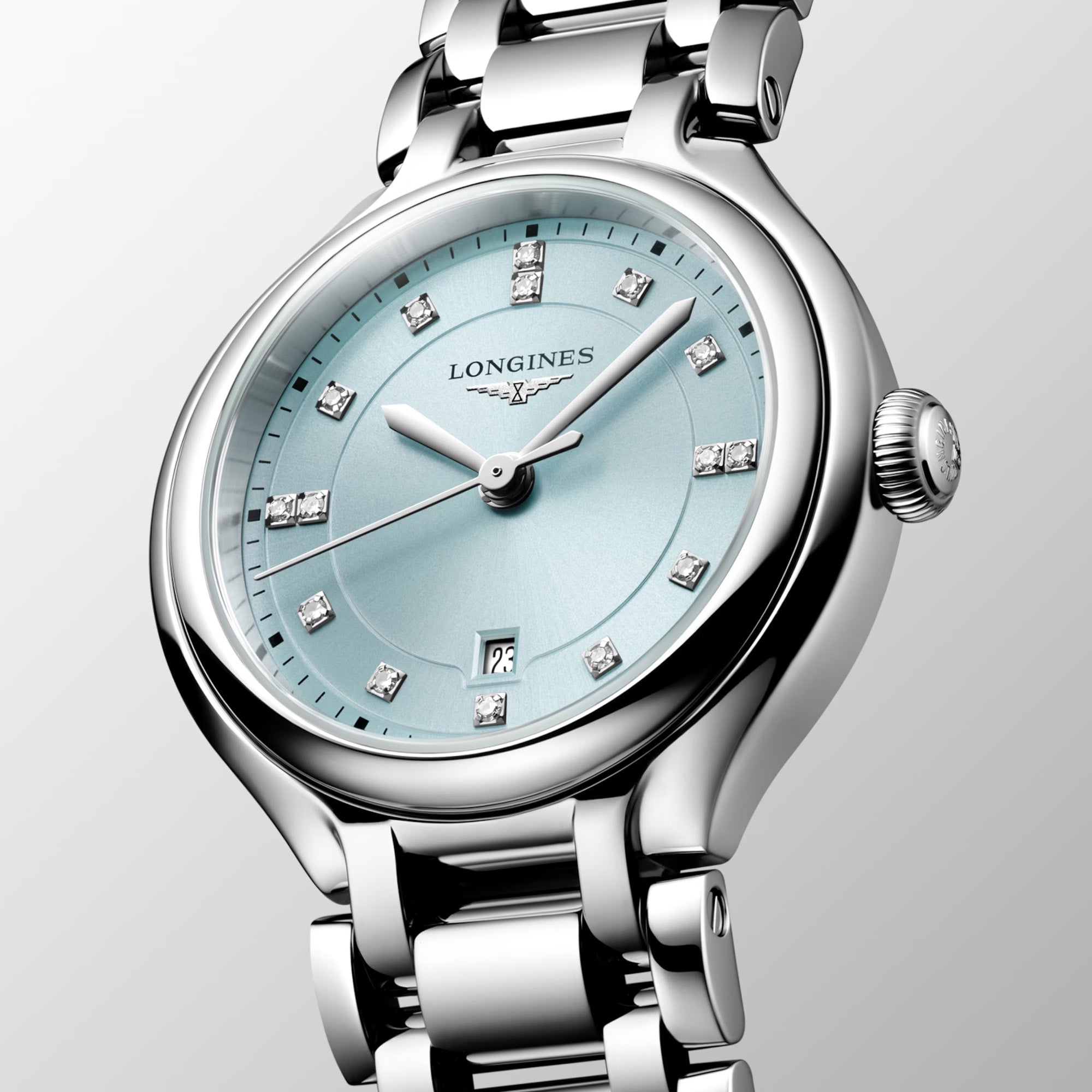 Longines PrimaLuna women’s watch featuring a polished stainless steel bracelet and 30mm round case, with a mint blue sunray dial accented by diamond hour markers, silver-tone hands, date display, and scratch-resistant sapphire crystal. Elegant Swiss luxury timepiece with refined feminine styling.