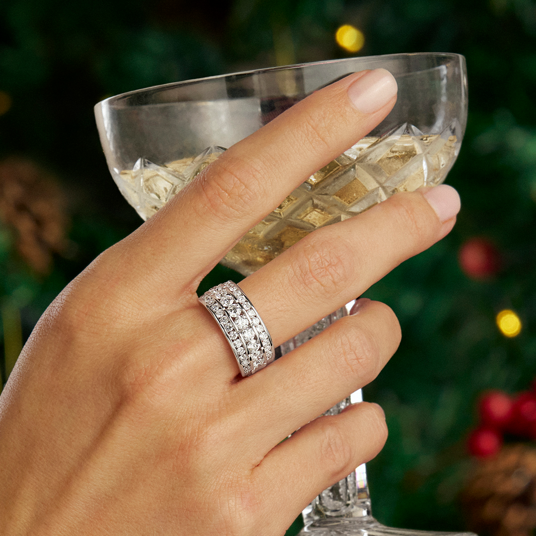 On-hand view of a hand wearing the Wallace Bishop 2.00 TDW Round Lab-Grown Diamond Ring in Sterling Silver, reference LG200RGSSO, with three rows of channel-set round lab-grown diamonds across the front of the finger.