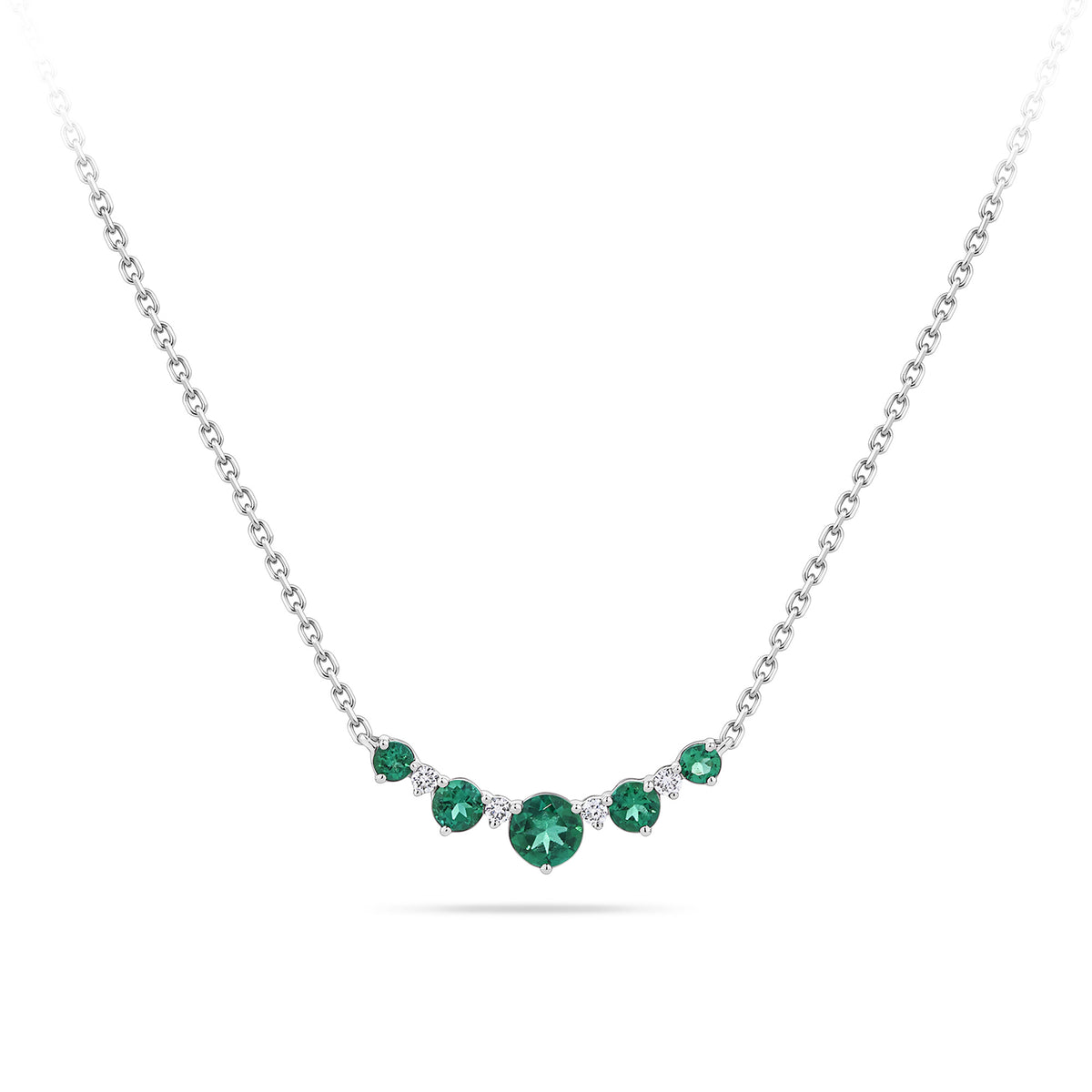 Front-on view of the Wallace Bishop 0.04 TDW Created Emerald & Lab-Grown Diamond Chevron Pendant in Sterling Silver, on a chain with a parrot clasp. The pendant features five graduated round created emeralds with four round lab-grown diamonds set between them in a curved chevron shape.