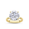 6.00ct Round Brilliant Lab-Grown Diamond Solitaire Ring in 18ct Yellow Gold — This GIA certified lab-grown diamond displays a colourless (F) grade and VS2 clarity, held in a secure basket setting. The round brilliant cut diamond is shown centred and facing forward against the yellow gold band, showcasing its brightness and faceted surface.