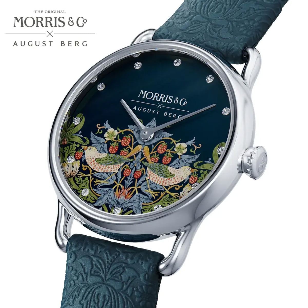Morris & Co x August Berg watch featuring a dark blue dial with a detailed botanical and bird illustration, a silver-toned case, and a textured teal leather strap.