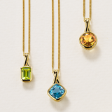 Cushion Cut Swiss Blue Topaz Twist Bezel Set Pendant in 9ct Yellow Gold