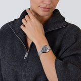 Rado DiaStar Original 30mm R12170113 worn on wrist – silver dial with blue crystals, Ceramos™ bezel, stainless steel bracelet, petite women’s 30mm automatic watch shown on wrist
