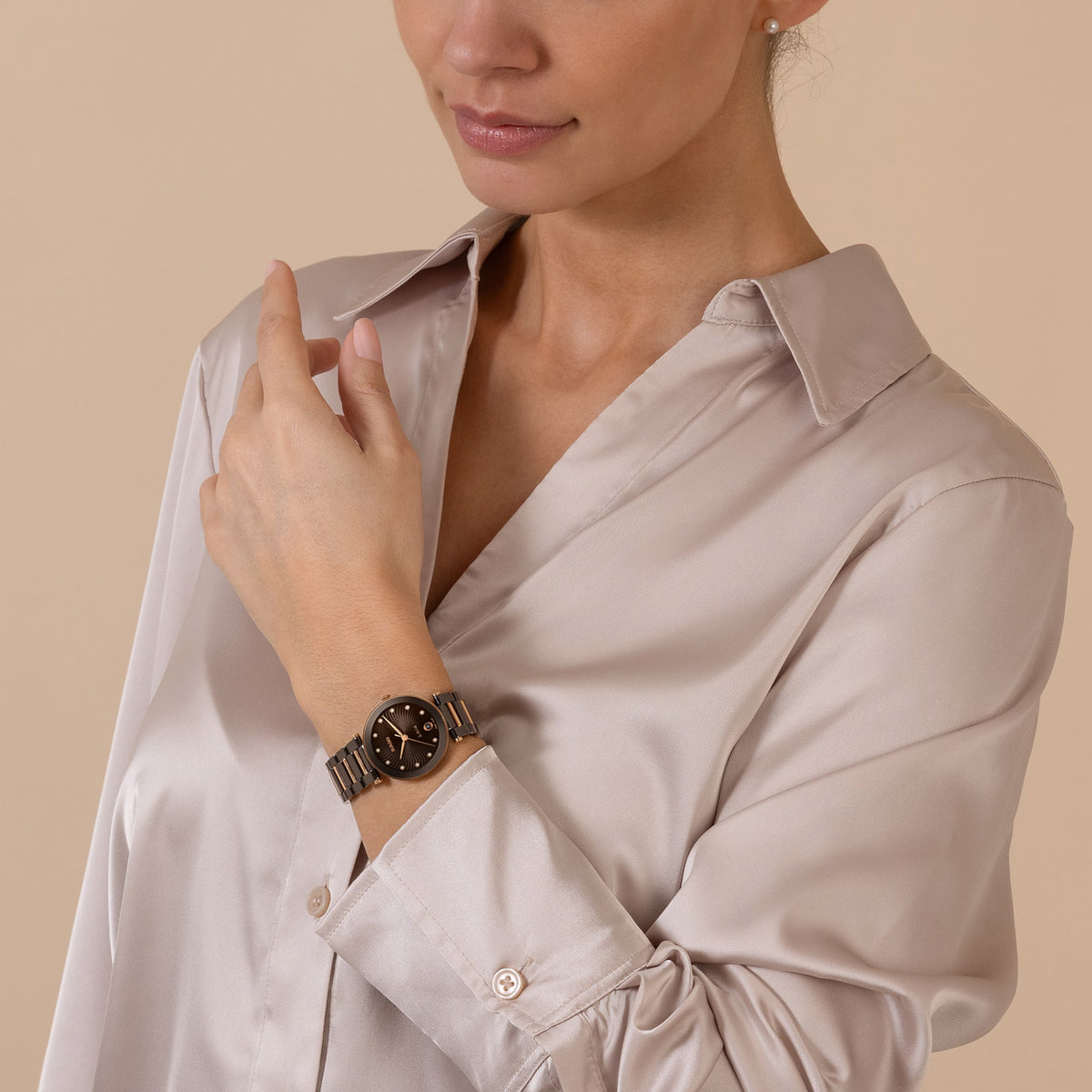 Rado LaCoupole Diamonds 31mm R22242703 worn on wrist – brown wave-pattern dial with diamond markers, brown ceramic case, brown ceramic and rose gold-tone bracelet, women’s 31mm quartz watch shown on wrist