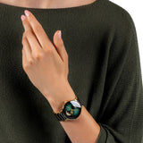 Rado Centrix Automatic Open Heart 39.5mm R30008302 worn on wrist – green gradient open heart dial, gold PVD case, gold and black ceramic bracelet, unisex 39.5mm automatic watch shown on wrist
