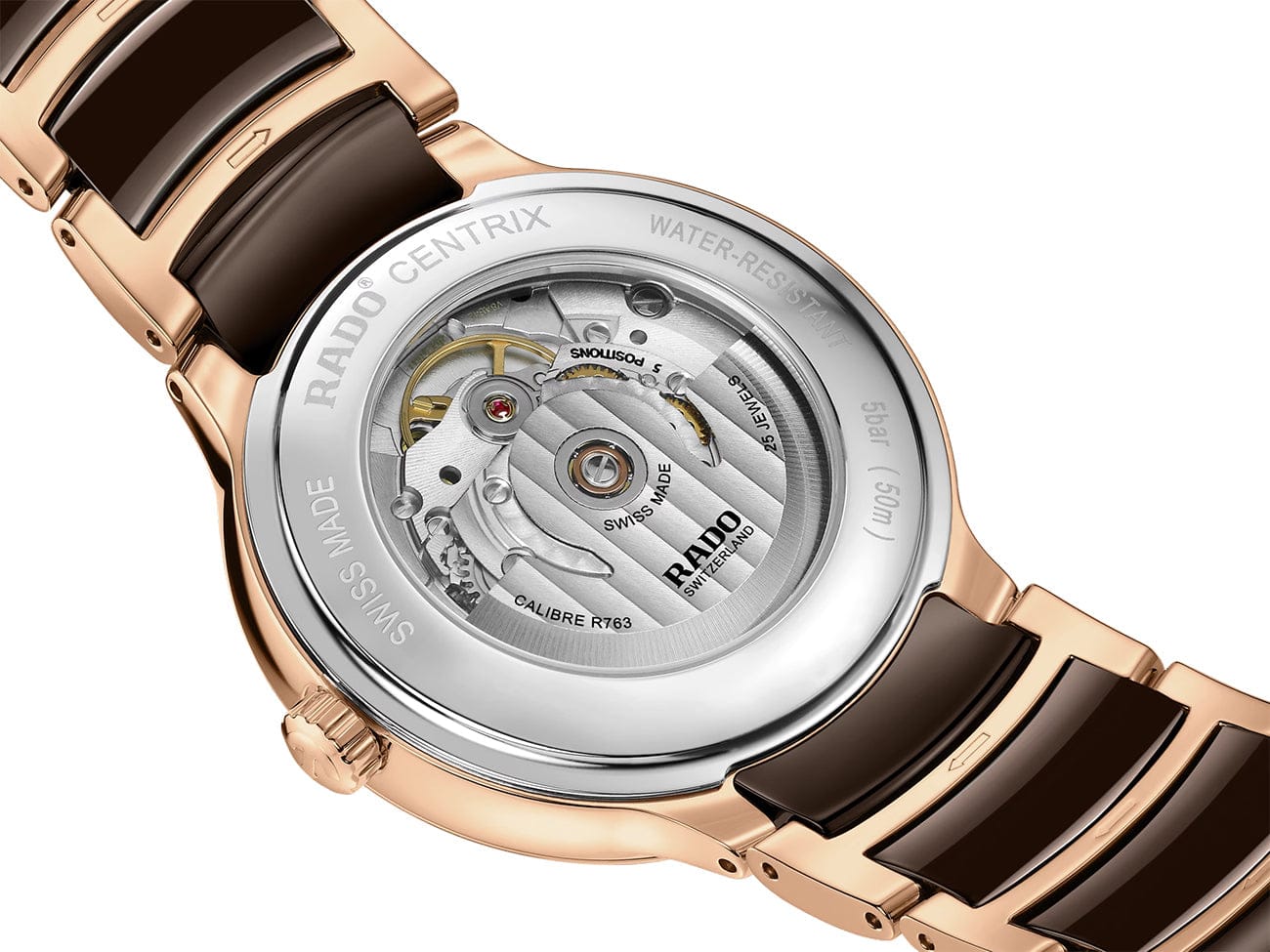 Back of case - Rado Centrix Men's 39.5mm automatic watch featuring rose gold PVD stainless steel bracelet with brown high-tech ceramic details, brown dial, Sapphire Crystal, and Date Display.