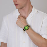 Rado Captain Cook x Cameron Green Limited Edition 42mm R32138318 worn on wrist with NATO strap – green sunray dial, gold bezel, green and yellow gold-coloured textile NATO-style strap in Australian colours