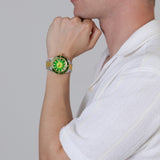 Rado Captain Cook x Cameron Green Limited Edition 42mm R32138318 worn on wrist – green sunray dial, gold bezel with green ceramic insert, two-tone rice-grain bracelet, men’s 42mm automatic dive watch shown on wrist