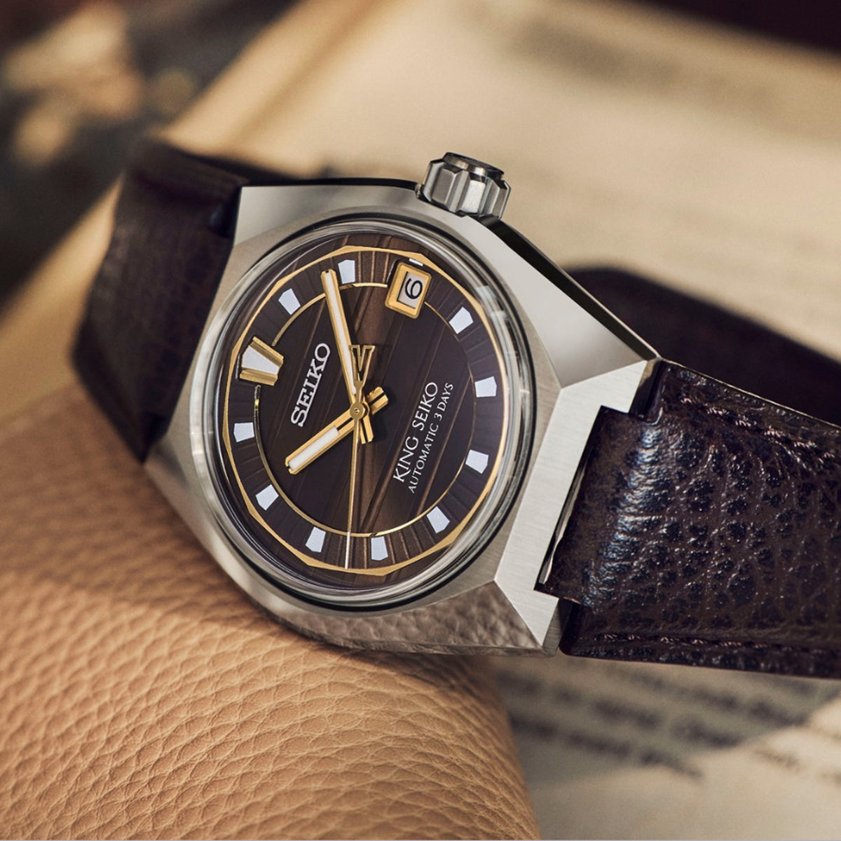 The King Seiko Vanac Automatic Men's 41mm Watch SLA093J reveals the dial's fine texture and golden accents in close detail.