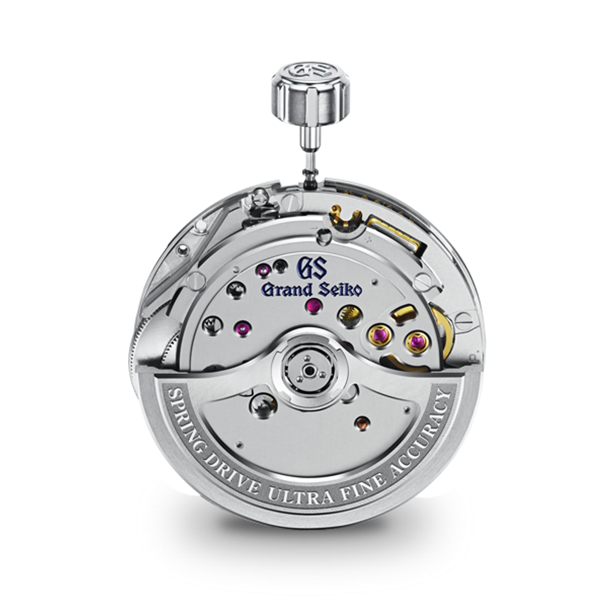 A close-up studio shot of a Grand Seiko automatic watch movement, showing the polished silver-toned steel components, jewel bearings, and crown, with the brand name 'Grand Seiko' and 'GS' logo printed on the plate.