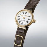The Seiko Presage Automatic 35mm Limited Edition Watch SPB538J reveals the enamel dial's fine craftsmanship, Roman numerals and applied gold Seiko logo in close detail.