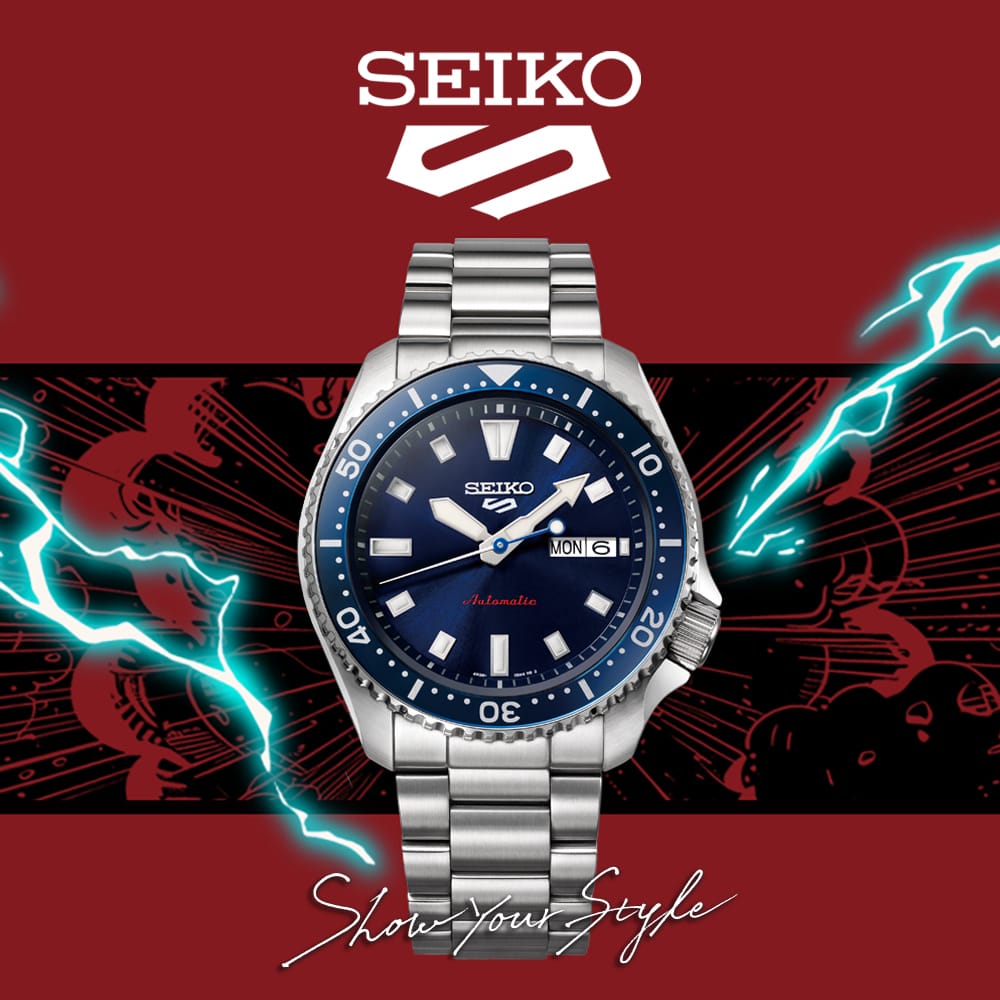 Seiko watch with blue dial and silver metal band on a red background with lightning effects.