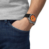 Tissot Seastar 2000 44mm T120.907.17.281.00 worn on wrist – orange dial, silver stainless steel case with black ceramic bezel, black rubber strap, bold 44mm professional dive watch shown on wrist
