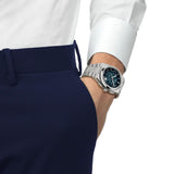 Tissot PRX Automatic Chronograph 42mm T137.427.11.041.01 worn on wrist – blue gradient chronograph dial, stainless steel case and integrated bracelet, bold 42mm 70s-inspired automatic chronograph shown on wrist