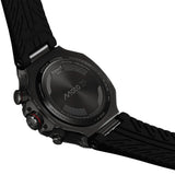 Close-up of the back of a Tissot T-Race MotoGP 2026 45mm T141.417.37.422.00 watch with a textured black strap, showing the branded case and dial details on a white background.
