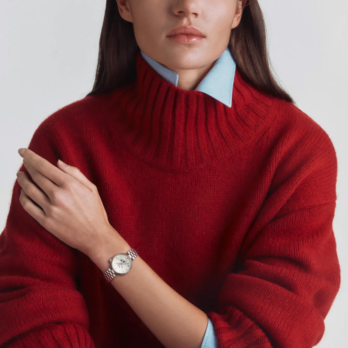 Tissot Désir 29.6mm T152.223.11.036.00 worn on wrist – silver moonphase dial with diamond indexes, domed stainless steel case and bracelet, elegant 29.6mm profile shown on wrist