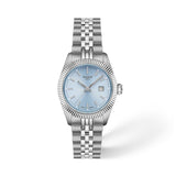 Tissot Ballade 30mm T156.010.11.351.00 front view – light blue guilloché dial, 316L stainless steel case with fluted bezel, Super-LumiNova® hands and indexes, date window, stainless steel link bracelet